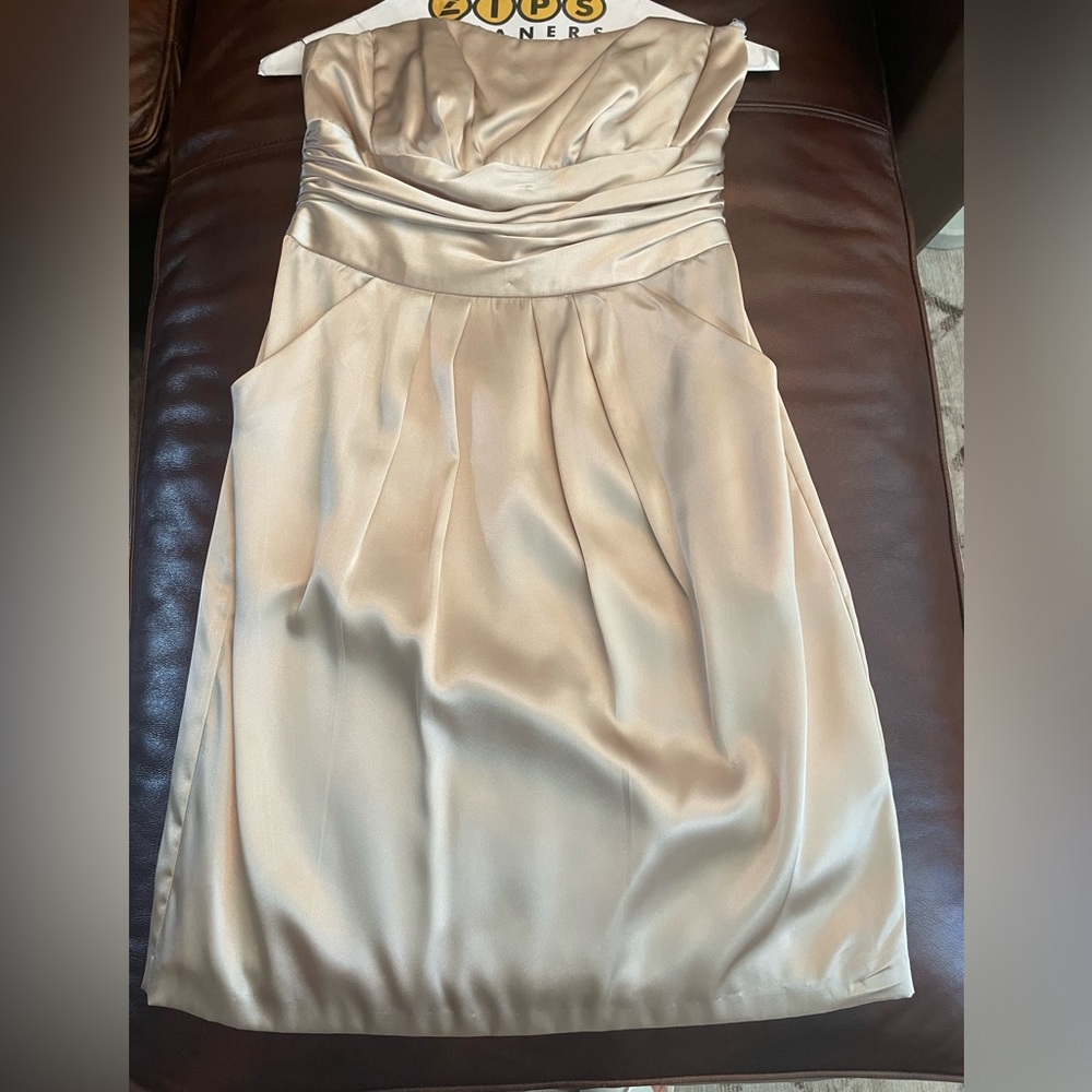 Champagne short dress. Perfect for weddings. Has pockets!